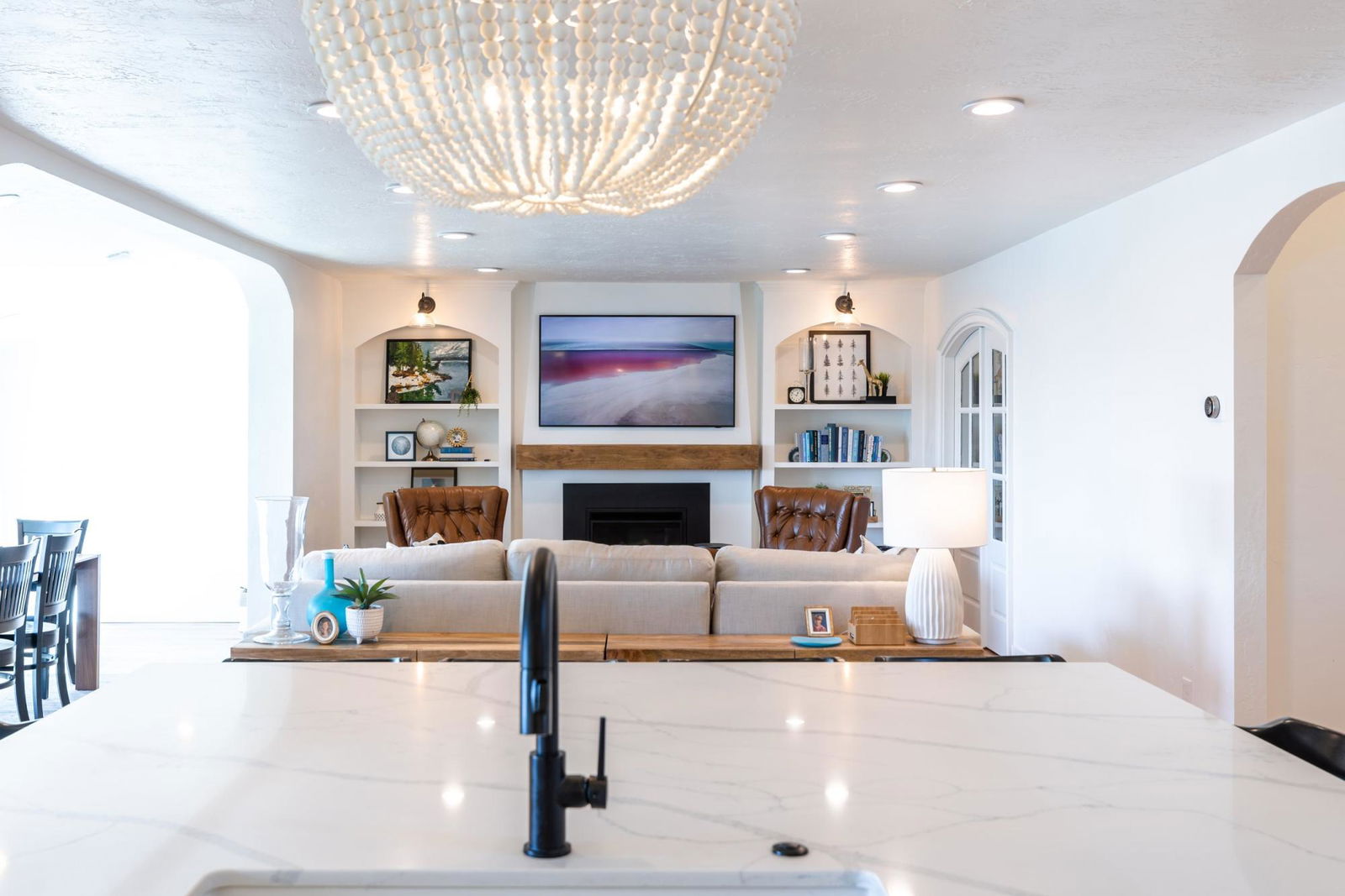 A living room filled with furniture and a fire place