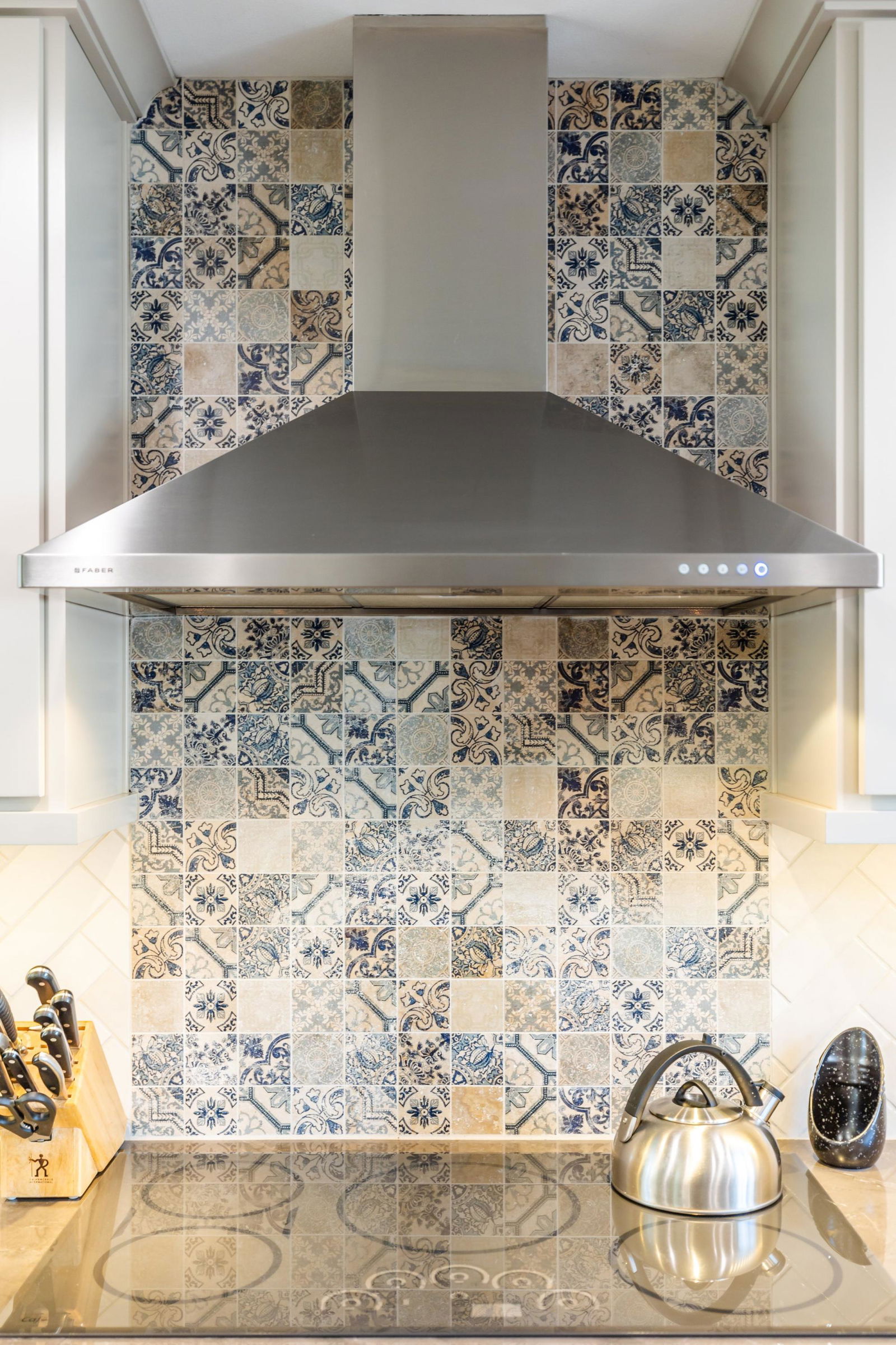 A stove top oven sitting inside of a kitchen