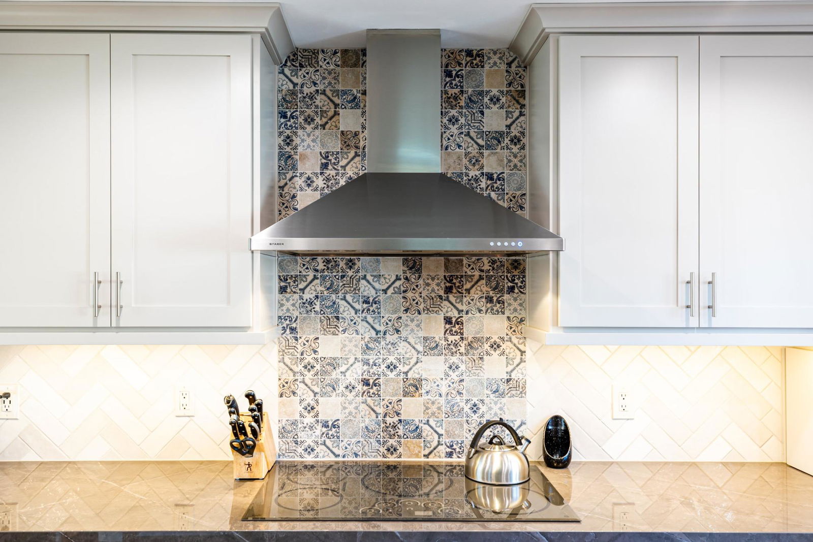 A stove top oven sitting inside of a kitchen