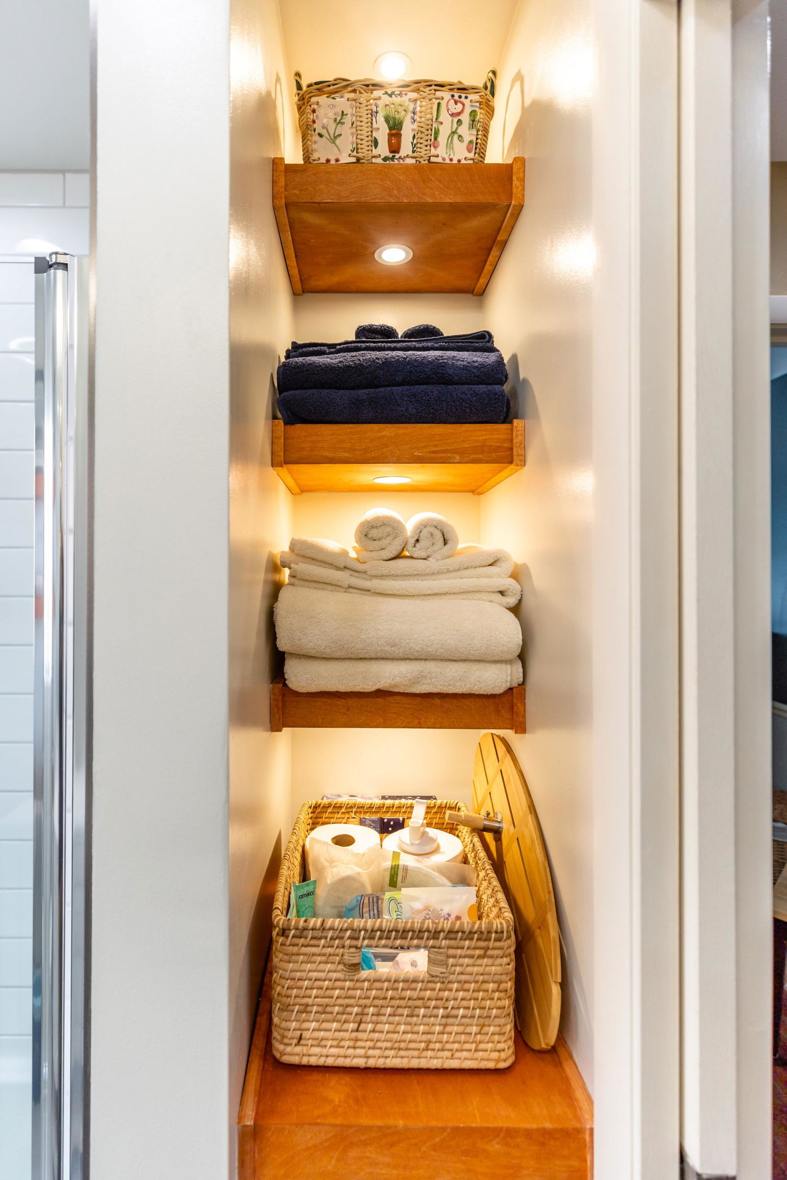 A closet filled with towels and other items