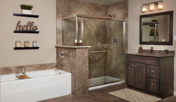 A bathroom with a tub, sink, and mirror