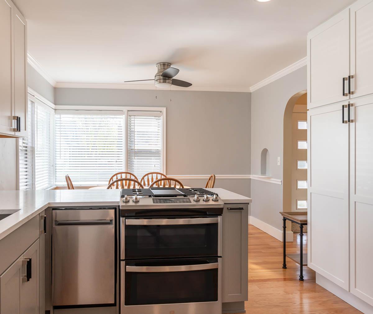 A kitchen with a stove top oven sitting inside of it