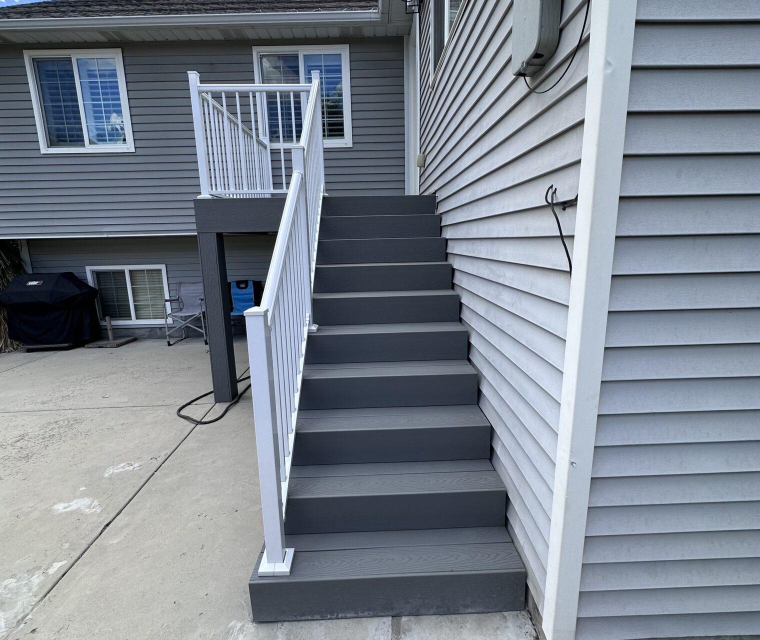 A set of stairs leading up to a house