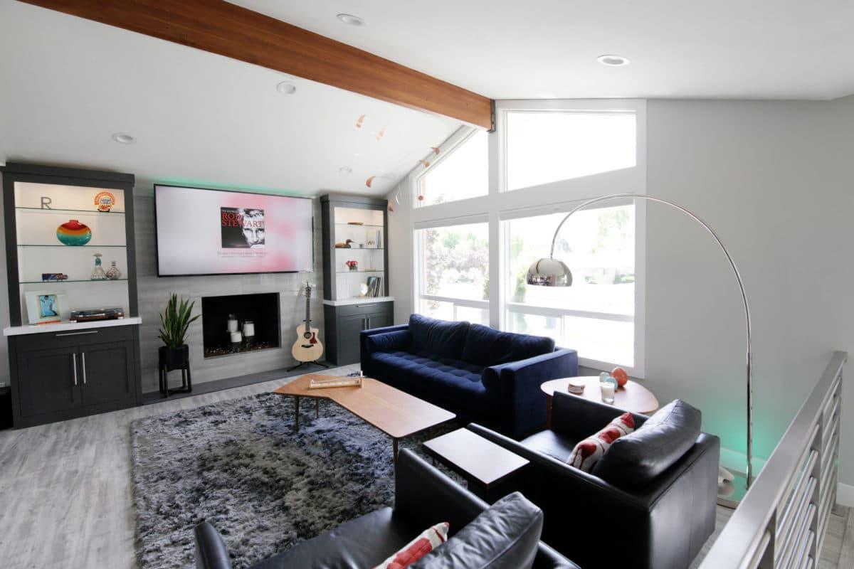 A living room filled with furniture and a fire place