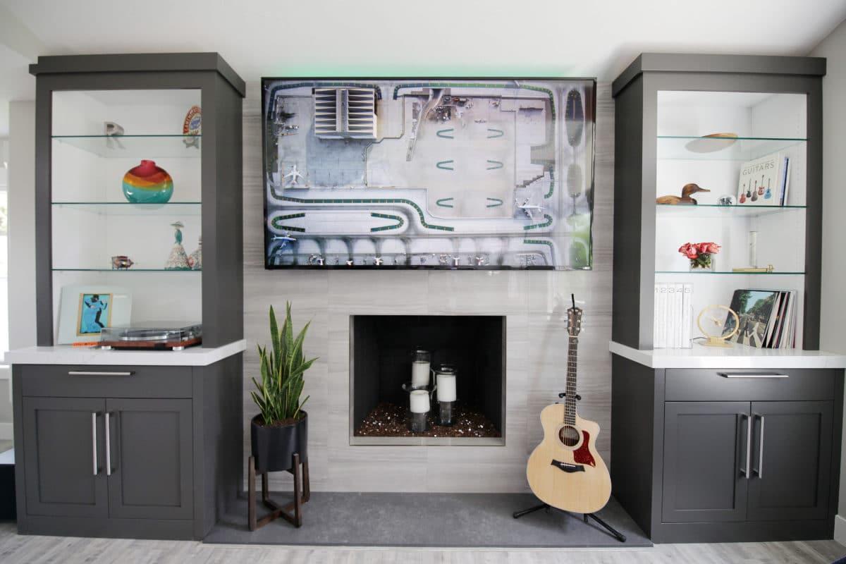 A living room filled with furniture and a fire place