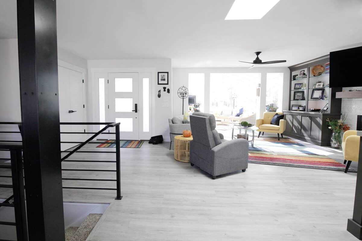 A living room filled with furniture and a fire place