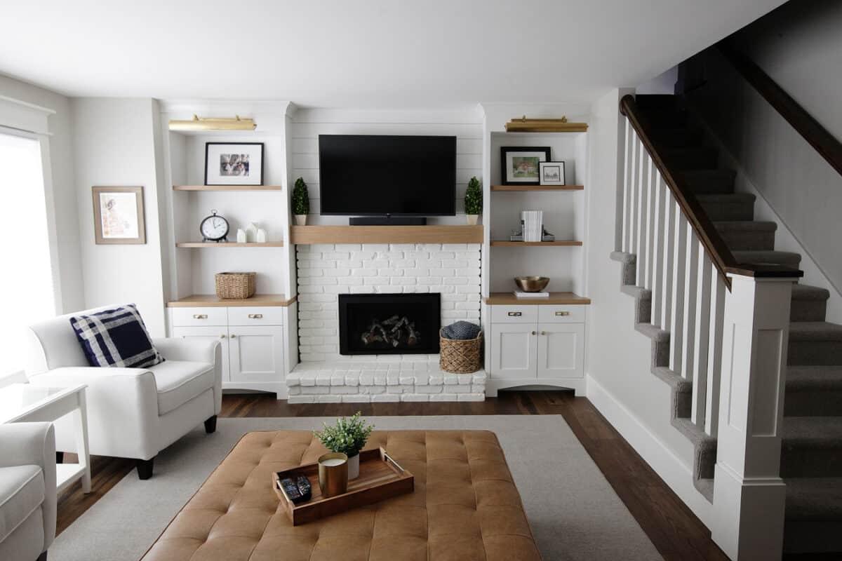 A living room filled with furniture and a fire place