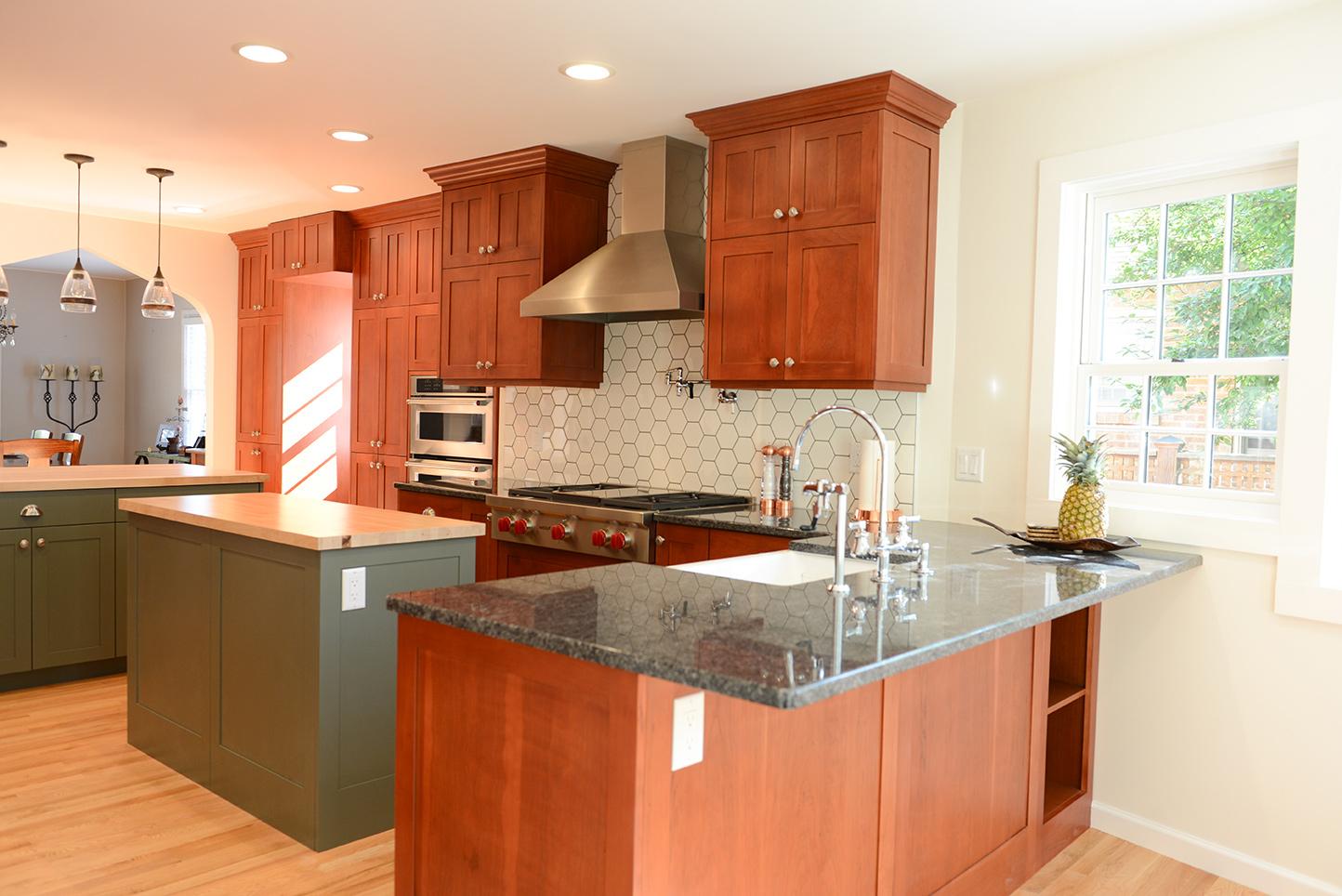 A large kitchen with a center island in the middle of the room