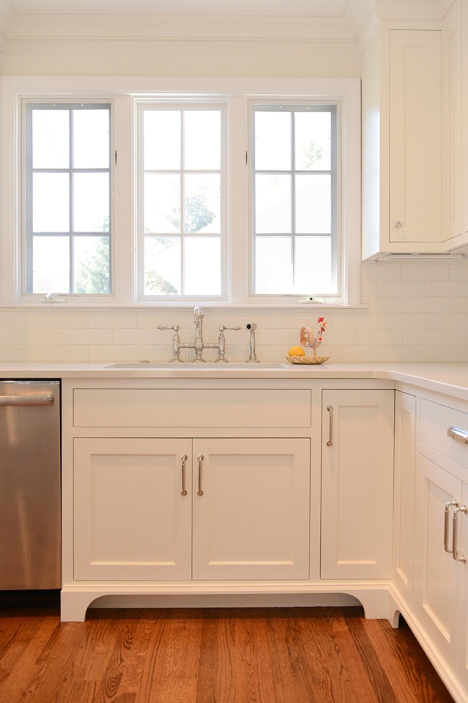 A kitchen with a dishwasher, sink and dishwasher