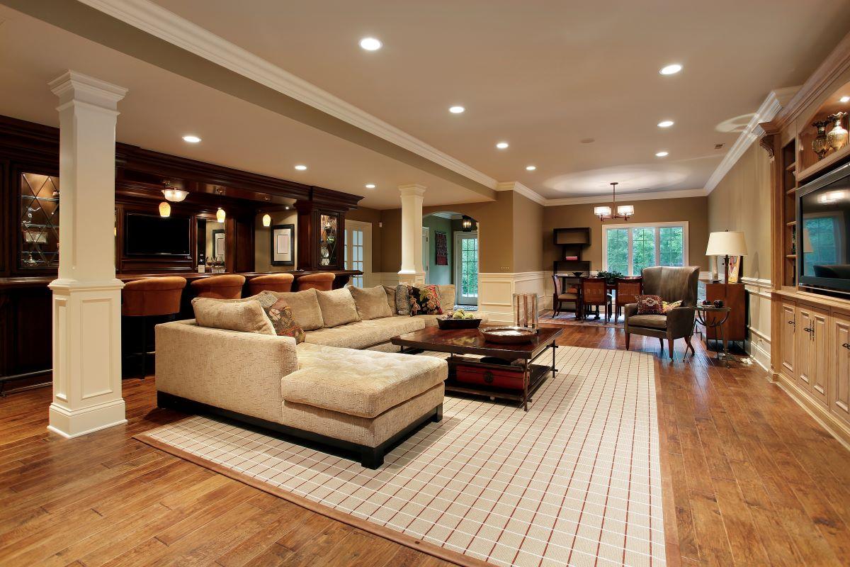 A living room filled with furniture and a flat screen tv