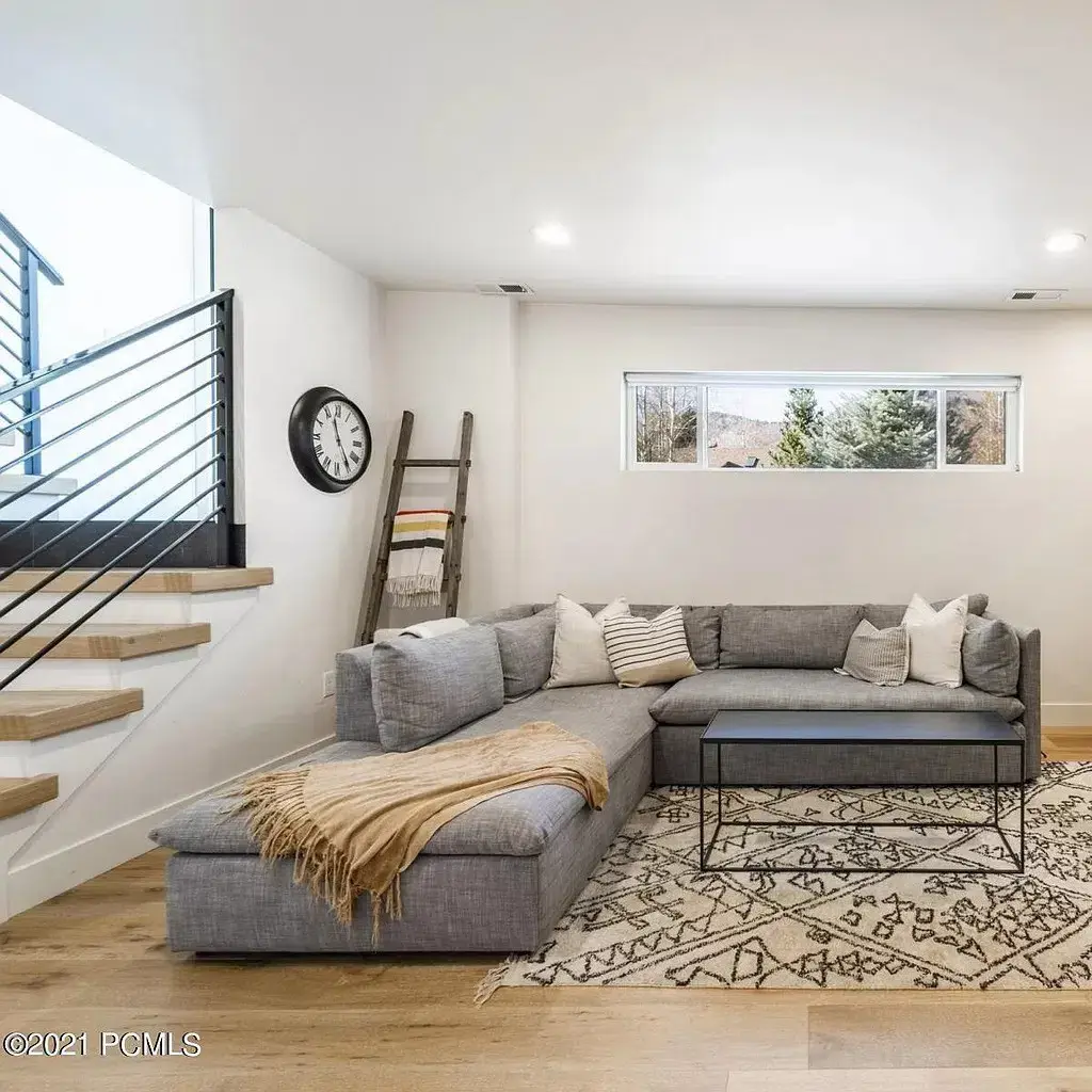 A living room filled with furniture and a fire place